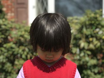 Close-up portrait of a girl looking down