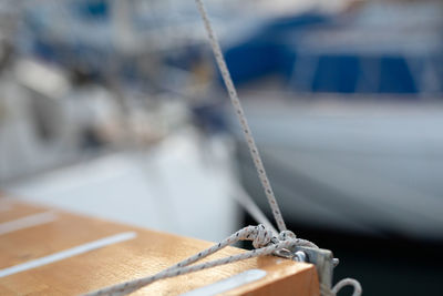 Close-up of rope tied on metal table