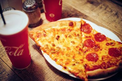 Close-up of pizza served on table