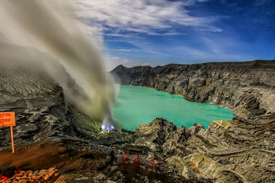 Scenic view of volcanic landscape against sky