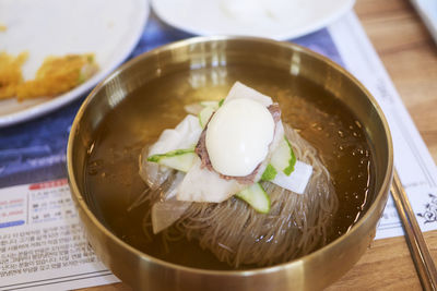 Close-up of noodles soup in bowl on table