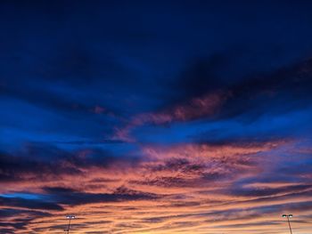 Low angle view of dramatic sky at sunset.