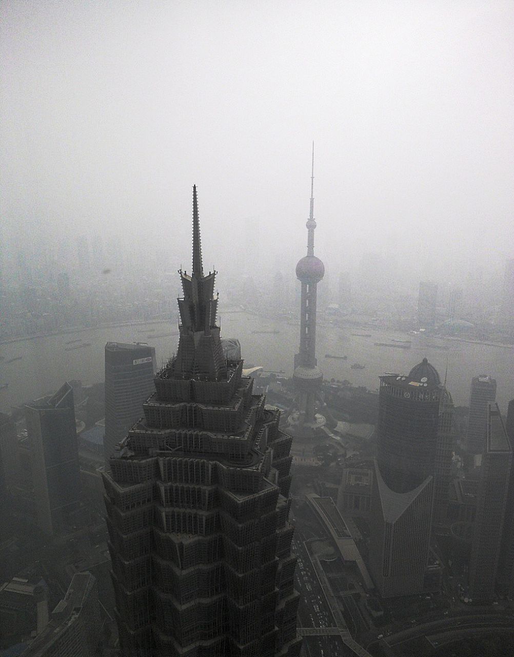 HIGH ANGLE VIEW OF CITY DURING FOGGY WEATHER