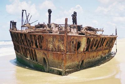 Old boat sailing in sea