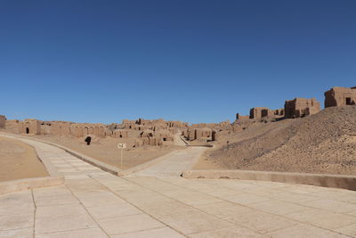 View of castle against clear blue sky