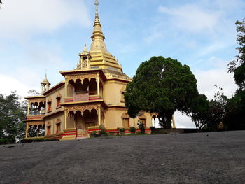 Exterior of temple building against sky