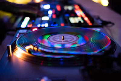 Close-up of dj turntable at nightclub