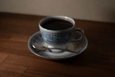 Close-up of coffee cup on table