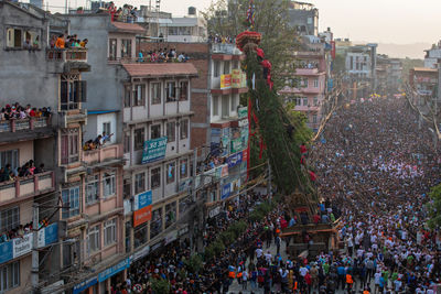 Devotees pull chariots as they take part in the festivities to mark the rato machindranath chariot.