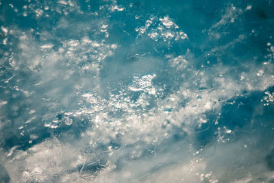 Full frame shot of water splashing against sky