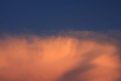 Low angle view of clouds in sky during sunset