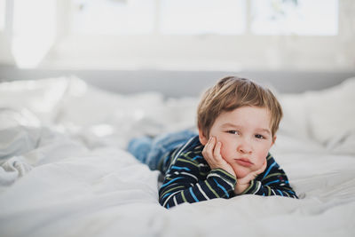 Bored boy looking at camera