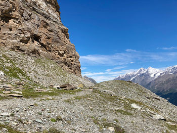 Low angle view of rock formation against sky