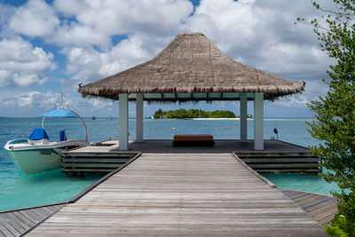 View of swimming pool against cloudy sky