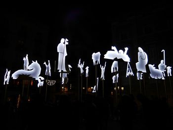 Statue of people at night