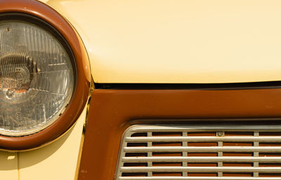 Close-up of yellow car