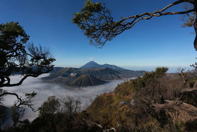 View of volcanic landscape against sky