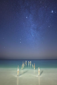 Scenic view of sea against sky at night