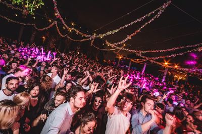 Panoramic view of crowd at music concert