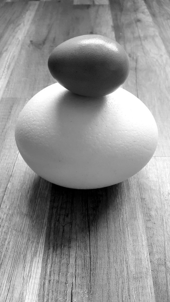 CLOSE-UP OF CUP ON TABLE