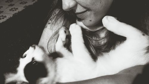 Close-up of young woman with hands