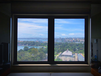 Scenic view of landscape seen through window