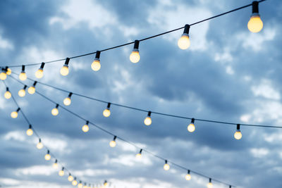 Low angle view of street light against sky