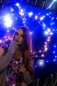 Portrait of young woman looking away