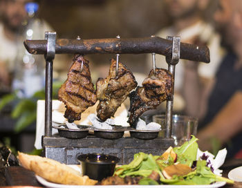 Close-up of meat on barbecue grill