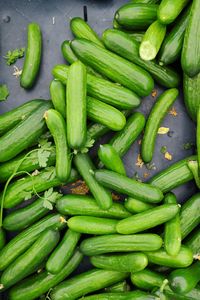 High angle view of green chili peppers at market