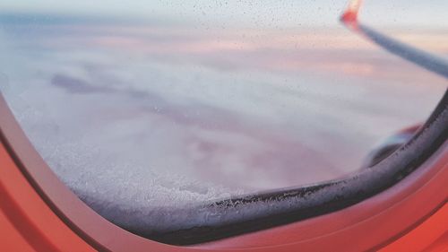 Close-up of airplane wing during winter