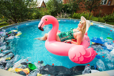 View of toys floating in swimming pool