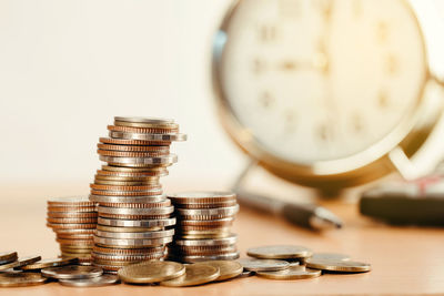 Close-up of coins on table