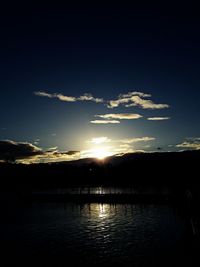 Scenic view of silhouette plants against sky during sunset
