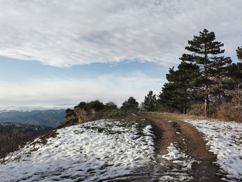 Scenic view of mountains against sky during winter