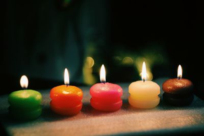 Close-up of candles on table