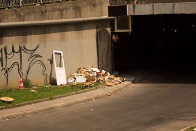 Graffiti on wall by building in city