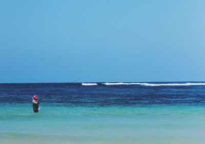 Scenic view of sea against clear sky