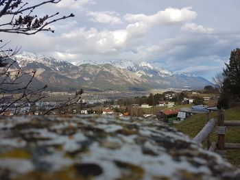 Scenic view of landscape and mountains against sky