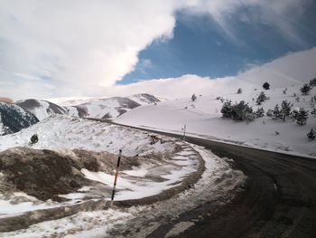 Snow covered mountain against sky