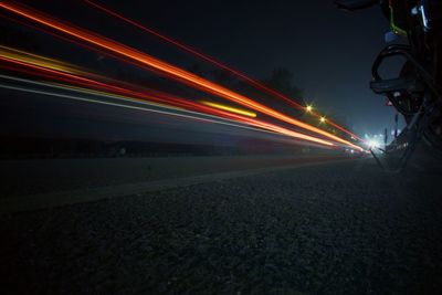 Light trails on road at night