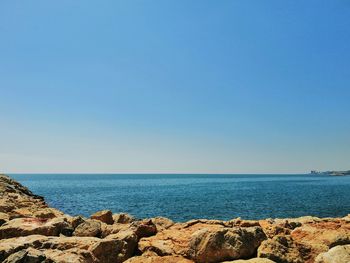 Scenic view of sea against clear sky