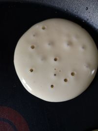 High angle view of egg in plate on table