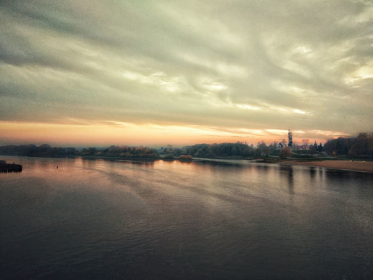 VIEW OF RIVER AGAINST SKY DURING SUNSET