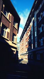 View of residential buildings against sky