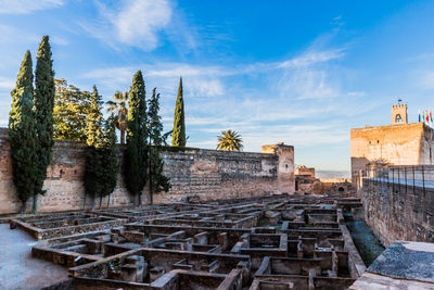 The arms square  or plaza de armas with the foundations of an old building in the alhambra