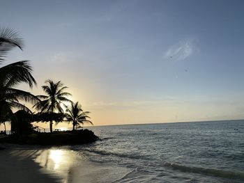 Scenic view of sea against sky at sunset