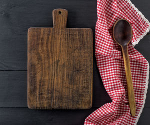 Directly above shot of wooden cutting board on table