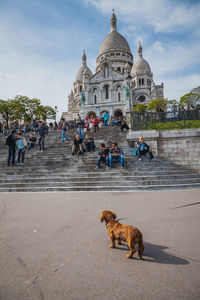 Group of people in front of building