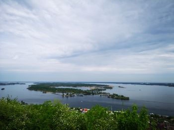 High angle view of bay against sky